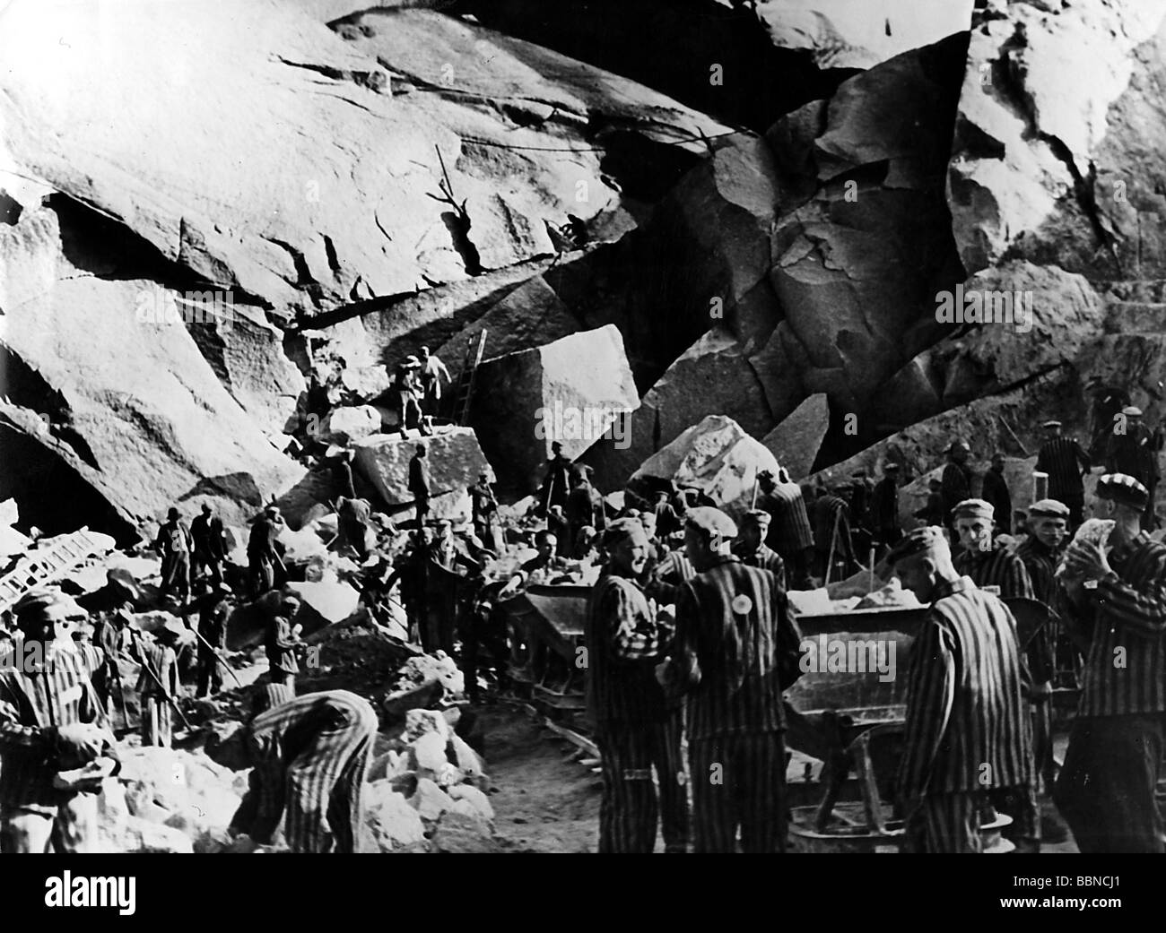 Nazism / National Socialism, crimes, concentration camps, Mauthausen, Austria, prisoners working in a stone pit, circa 1940, Stock Photo