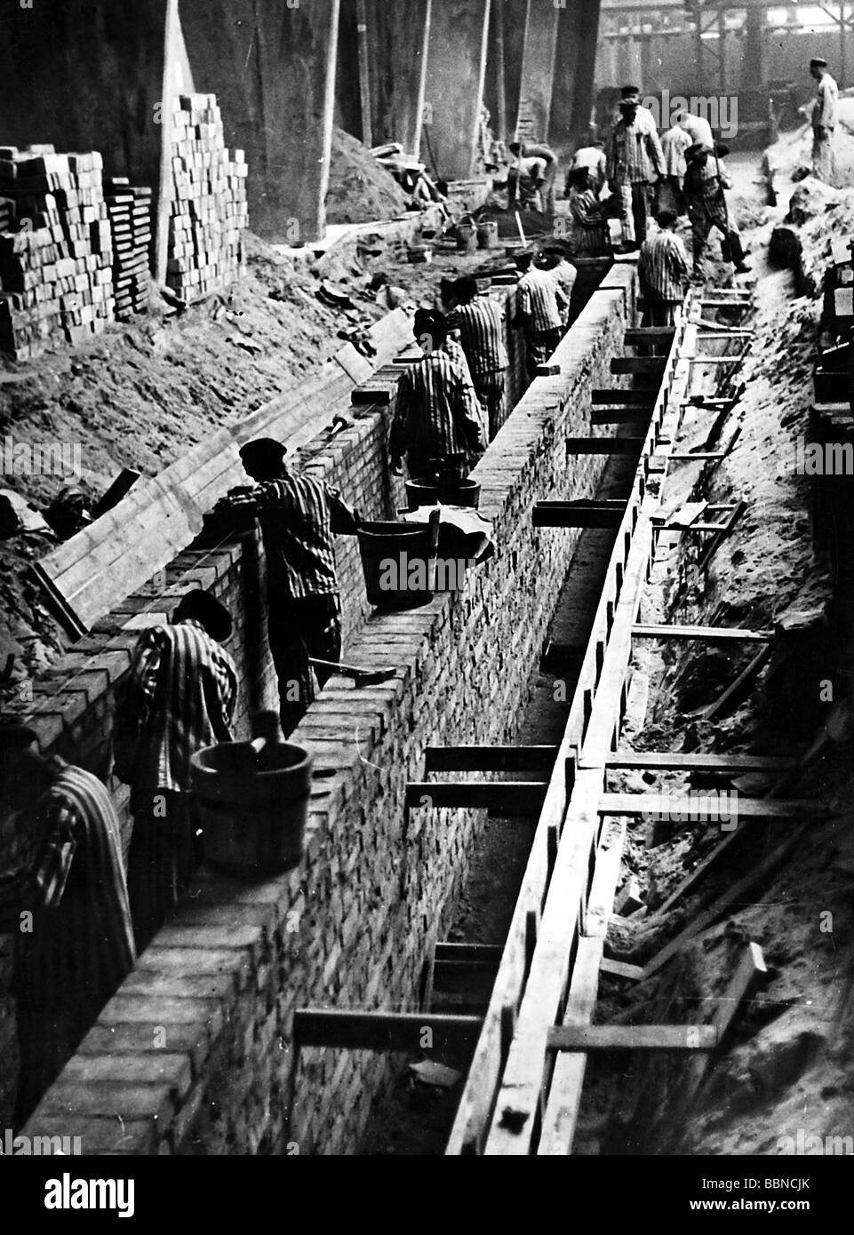 Nazism / National Socialism, crimes, concentration camps, Mauthausen, Austria, prisoners working in a stone pit, circa 1940, Stock Photo