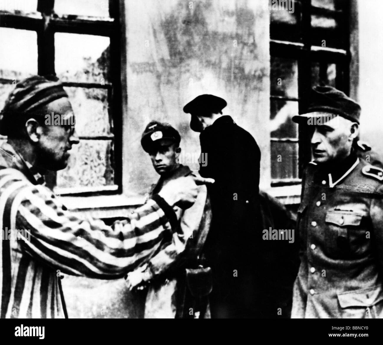 Nazism / National Socialism, crimes, concentration camps, Buchenwald, liberation, prisoner pointing on SS guard, 12.5.1945, Stock Photo