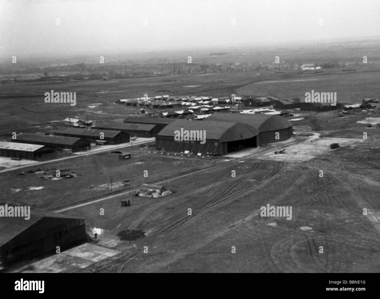 WW2 1940 winter photo of German Messerschmidt parked at grass airfield WW2 1940 winter photo of German Messerschmidt parked at grass airfield