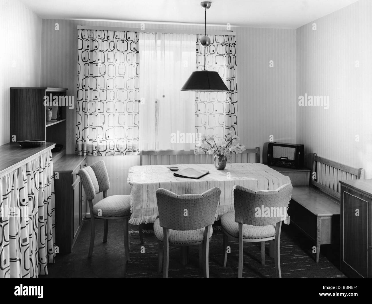 habitation, dining room, sitting area with radio set, 1950s, 50s, furniture, broadcasting, seats, chairs, table, curtain, 20th century, historic, historical, Stock Photo