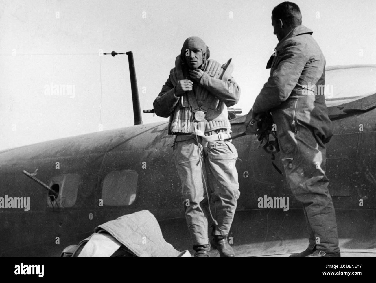 events, Second World War / WWII, aerial warfare, persons, German bomber Heinkel He 111 back from a mission, crew members on the wing, circa 1941, 20th century, historic, historical, Luftwaffe, Wehrmacht, Germany, Third Reich, soldier, soldiers, aviator, aviators, Germany, pilots, uniform, uniforms, flying suit, cap, caps, life vest, vests, air jacket, jackets, He111, He-111, pilot, pilots, people, 1940s, Stock Photo