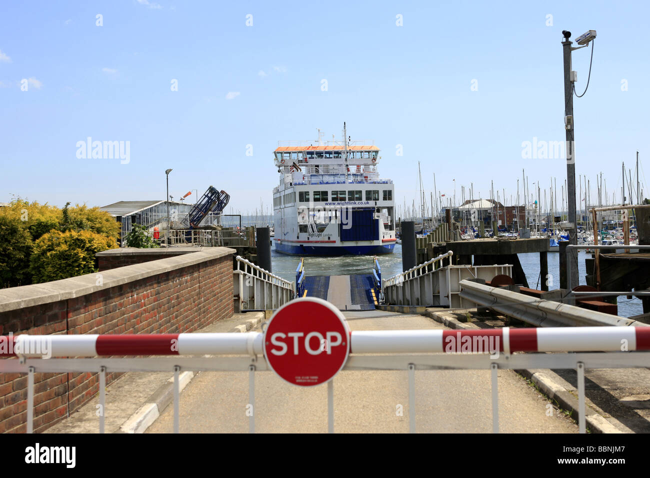 The Isle of Wight ferry at Lymington in Hampshire behind the barrier