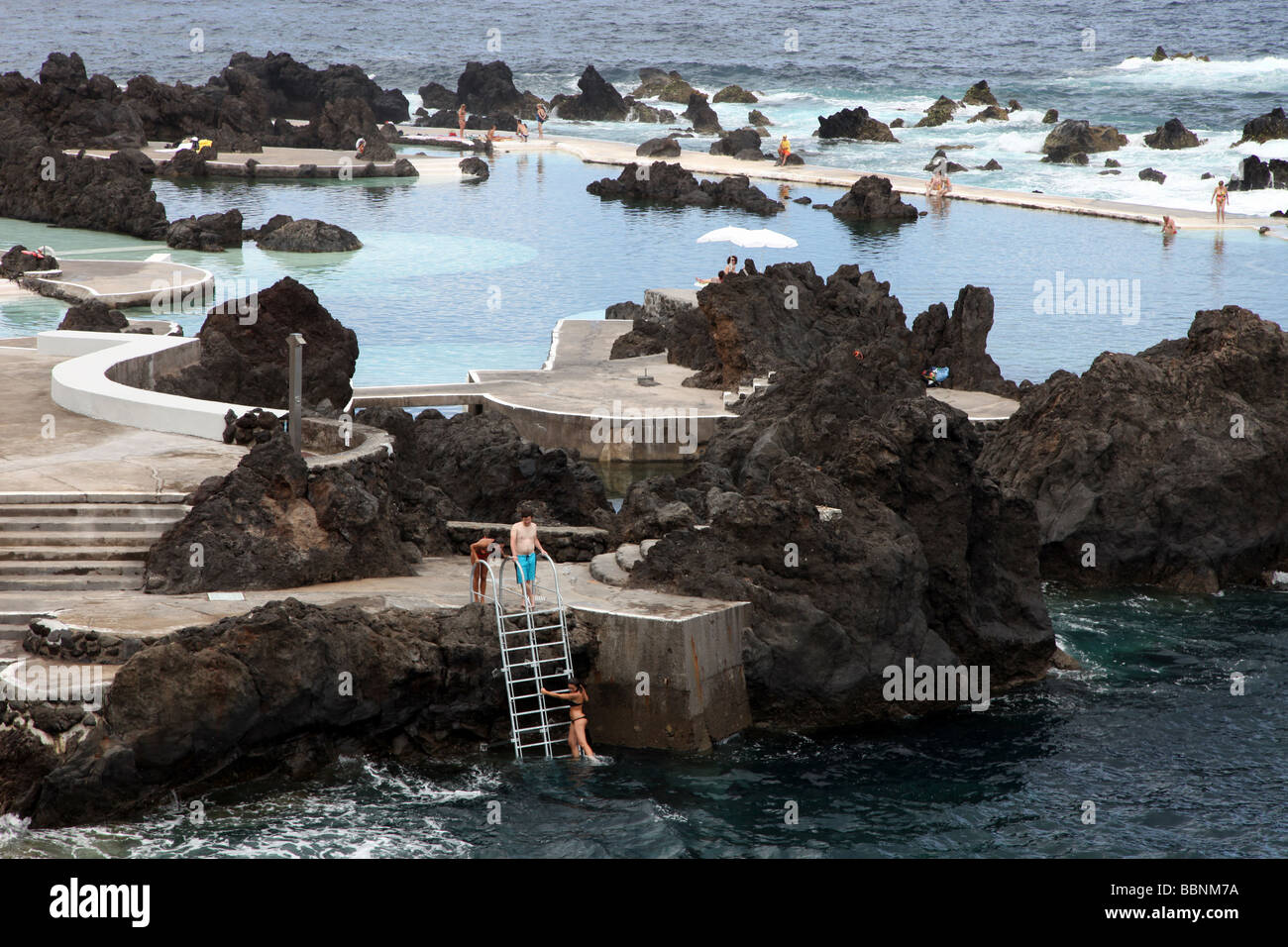 Porto Moniz village in north east Madeira with natural volcano swimming ...