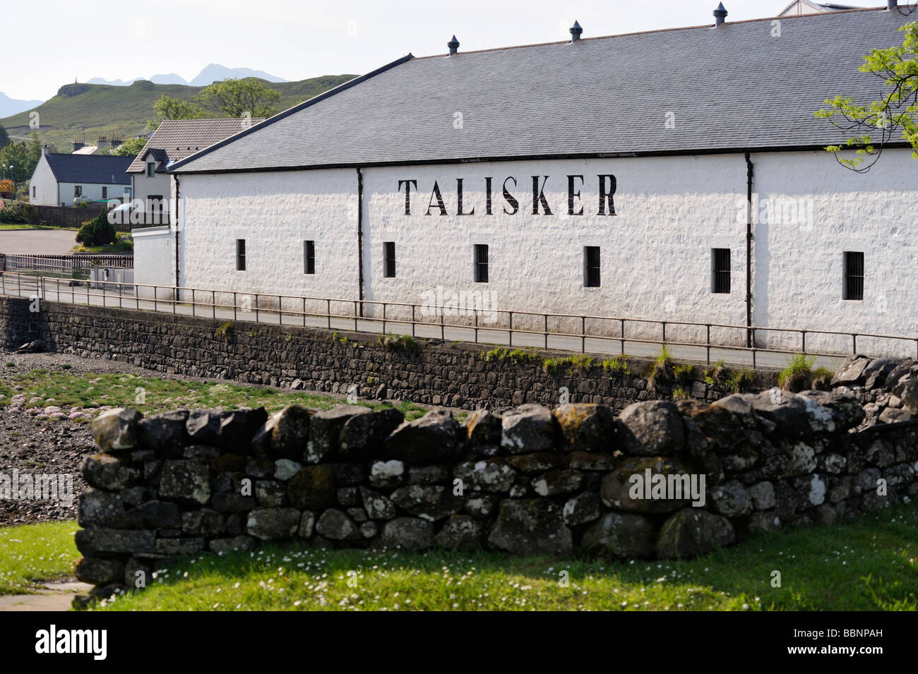 Talisker whisky distillery. Carbost, Loch Harport, Minginish, Isle of Skye, Inner Hebrides, Scotland, United Kingdom, Europe. Stock Photo