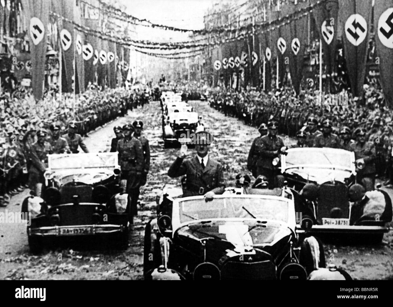 Hitler, Adolf, 20.4.1889 - 30.4.1945, German politician (NSDAP), Fuehrer and Reich Chancellor since 1933, half length, in open-topped car, probably during Nuremberg Rally, 1930s, Stock Photo