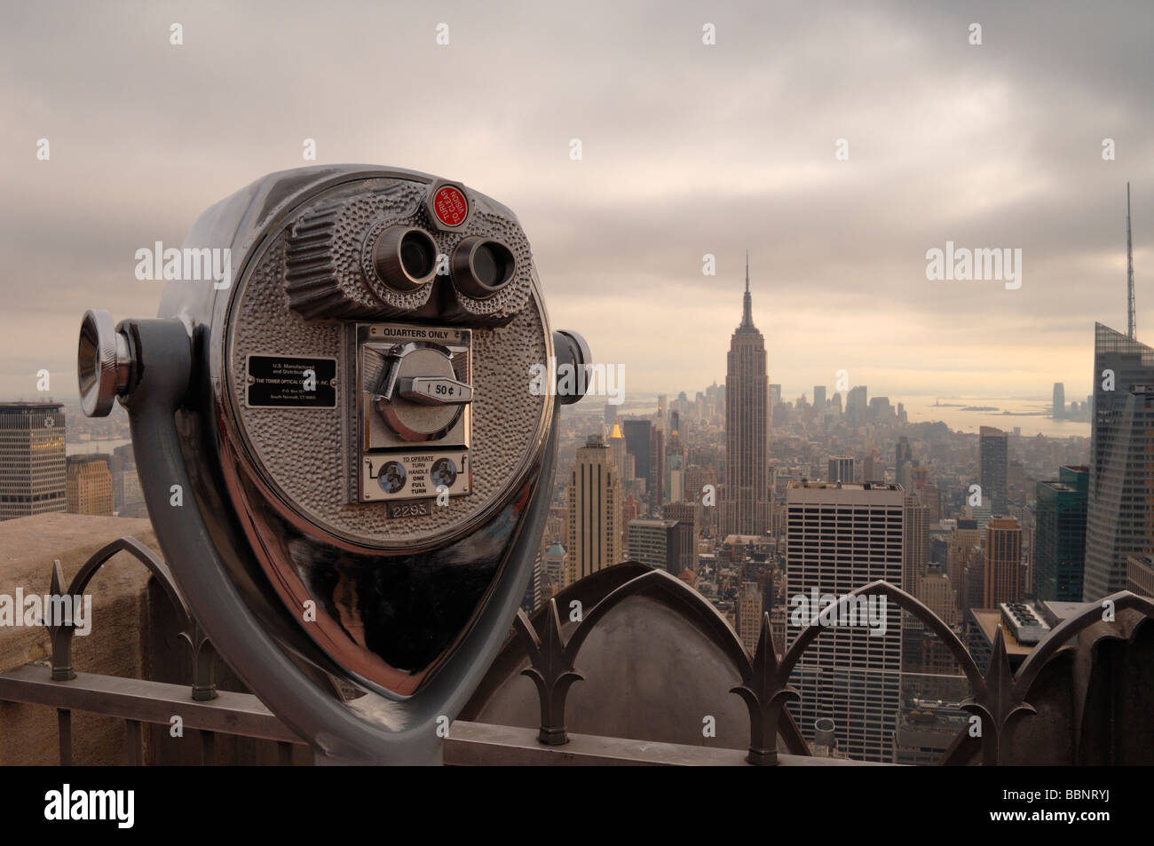 Viewfinder binoculars with the New York skyline in the background at the Top of the Rock lookout New York City NY USA Stock Photo