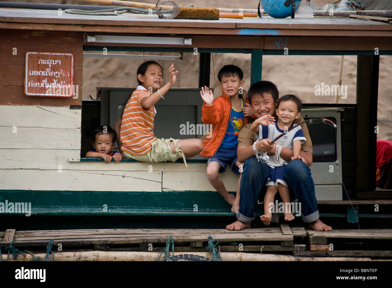 Luang Prabang,Laos;Family living on a houseboat Stock Photo Alamy