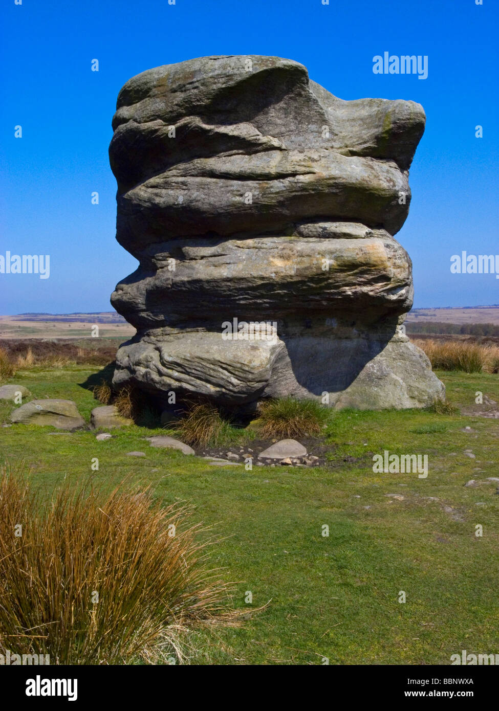 Eagle Stone rock formation on Baslow Edge in the Peak District National Park Derbyshire England UK Stock Photo
