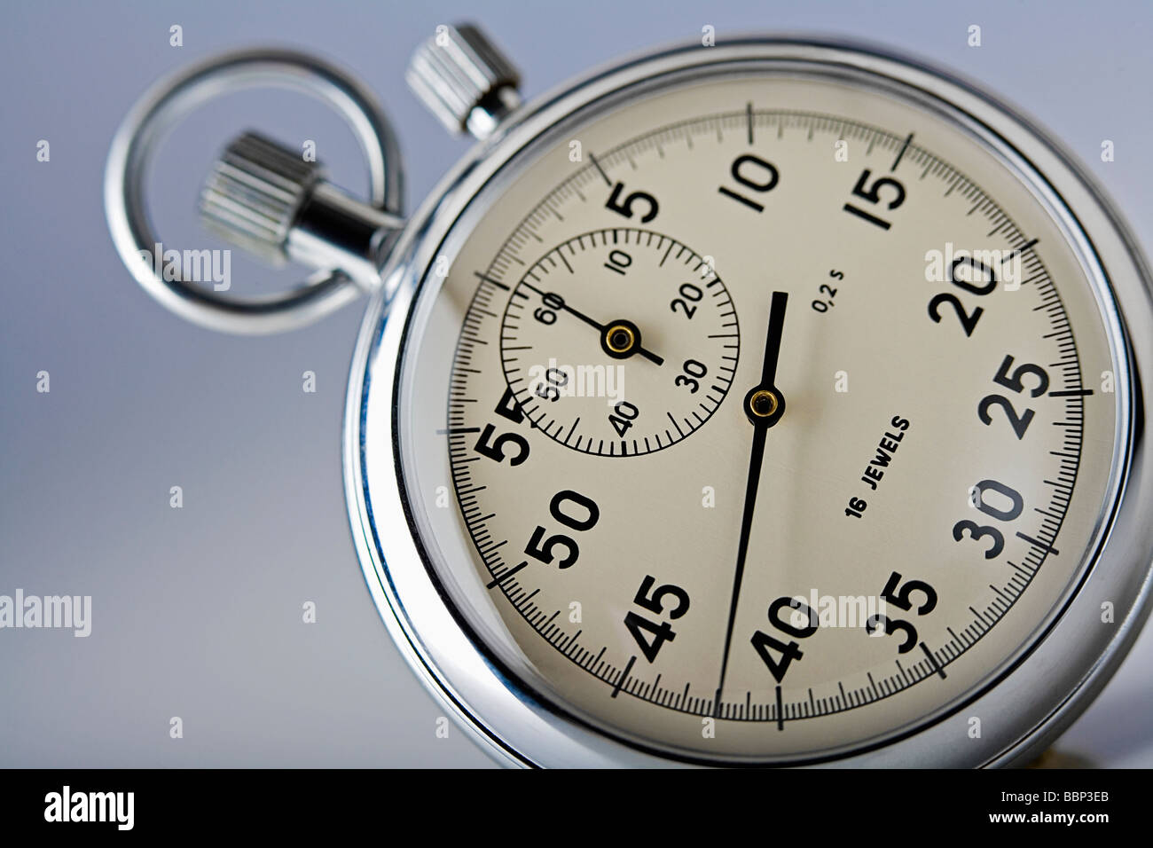 close up of a stopwatch isolated on gray background Stock Photo