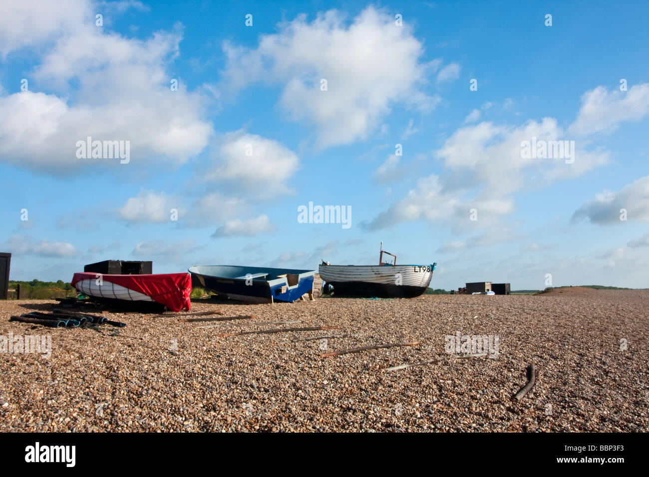 Traditional wooden fishing boats on the shingle beach at Dunwich on the ...