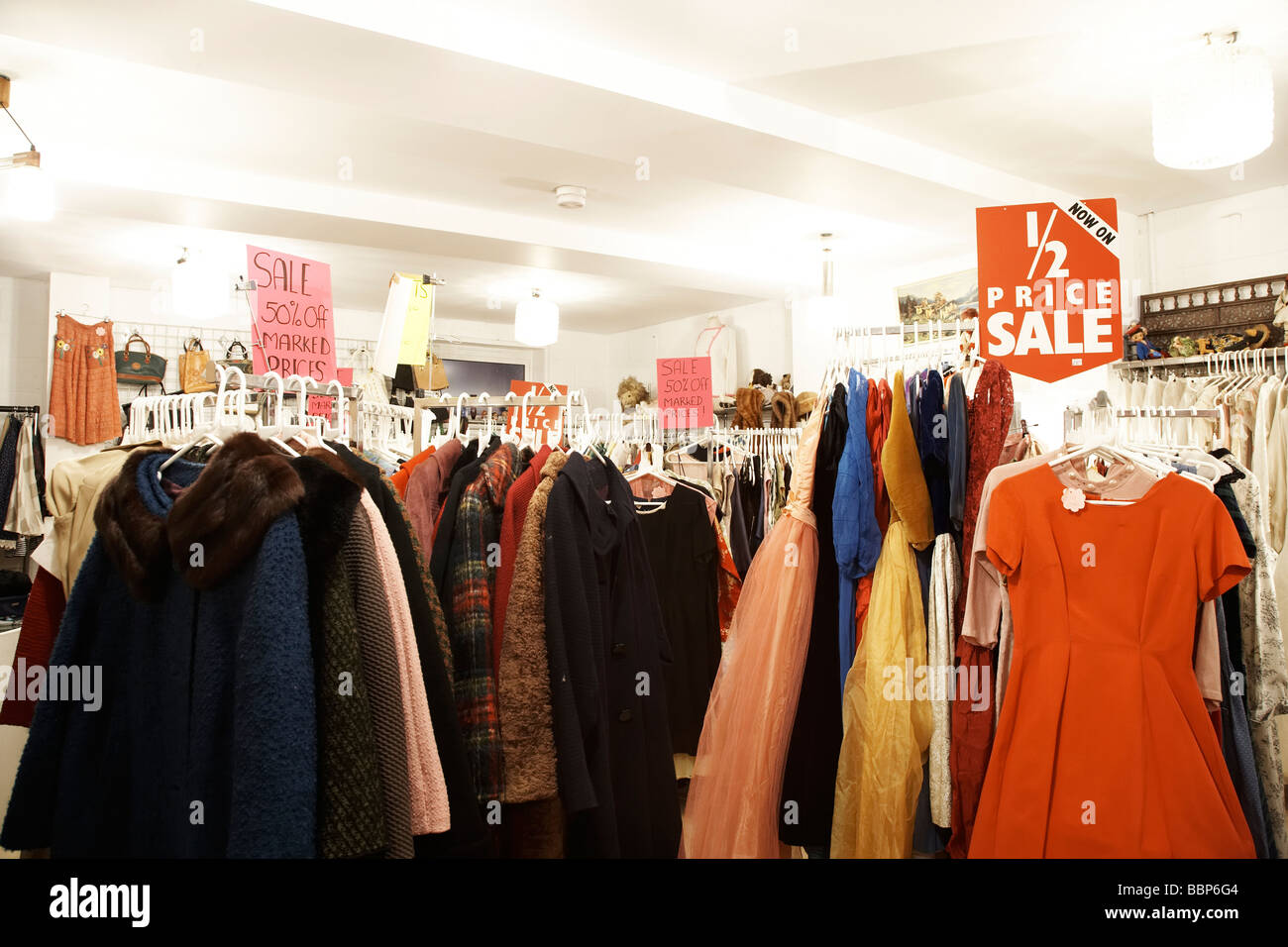 Clothes on sale, in a vintage secondhand shop Stock Photo Alamy