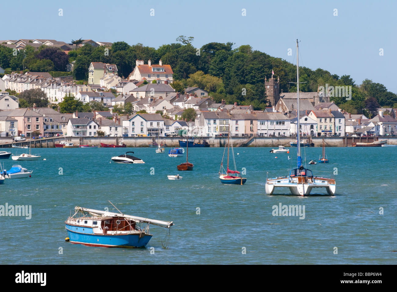 a postcard view of appledore from the shore of instow beach with boats and yachts moored Stock Photo
