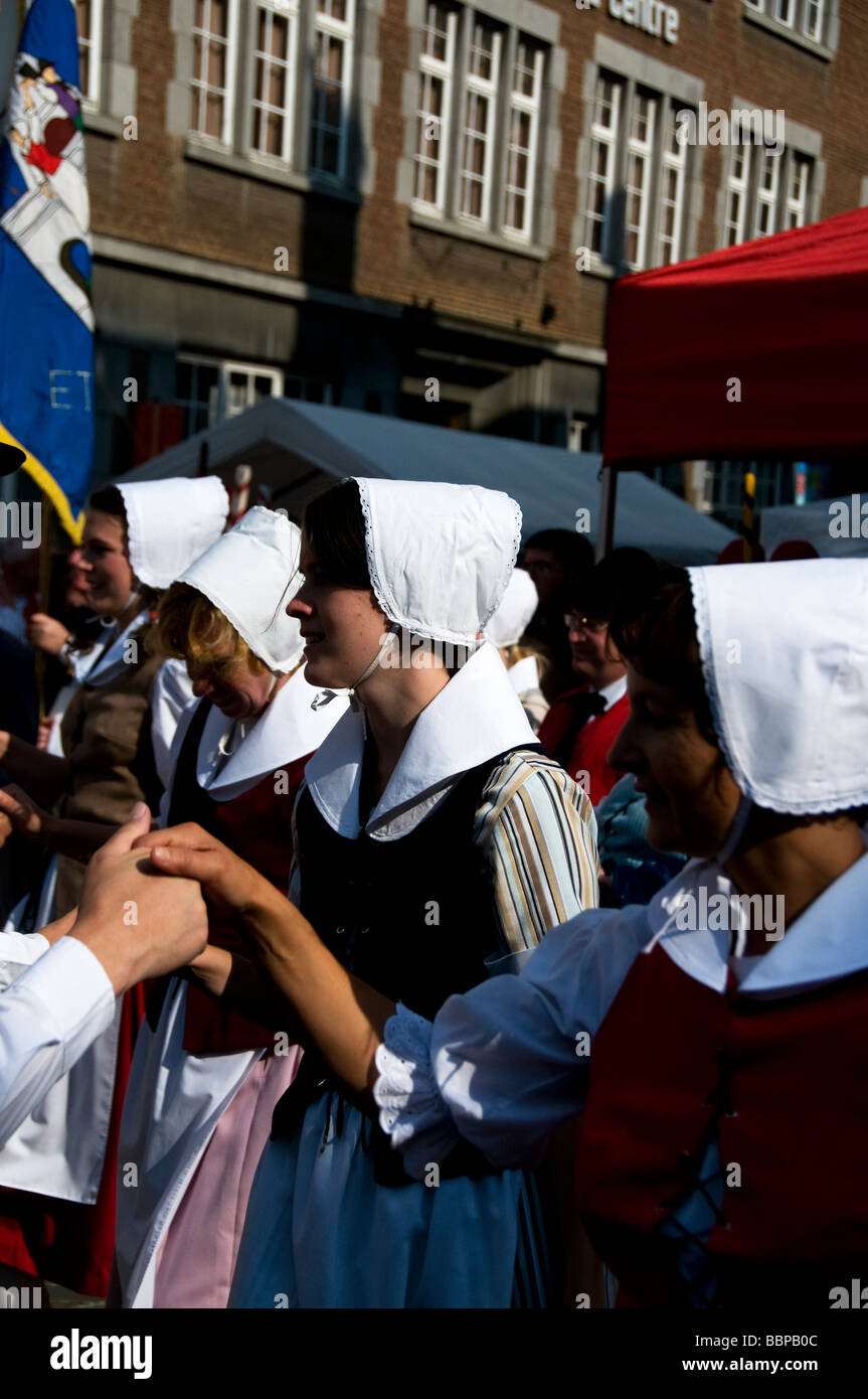 Dancers perform at the Gold Stilt Festival Namur Wallonia Belgium Stock Photo