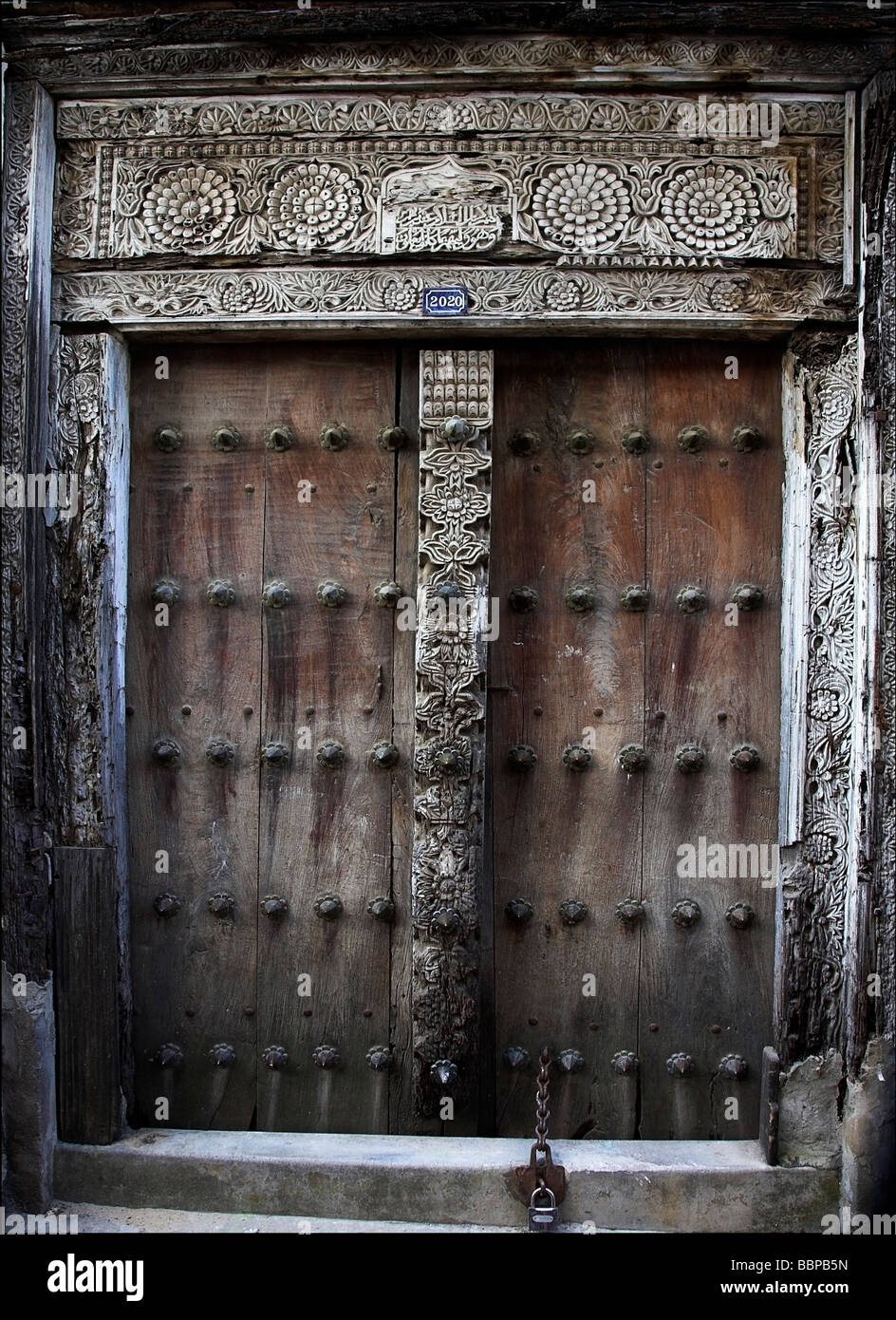 Zanzibar,Africa;Ornately carved wooden doorway Stock Photo