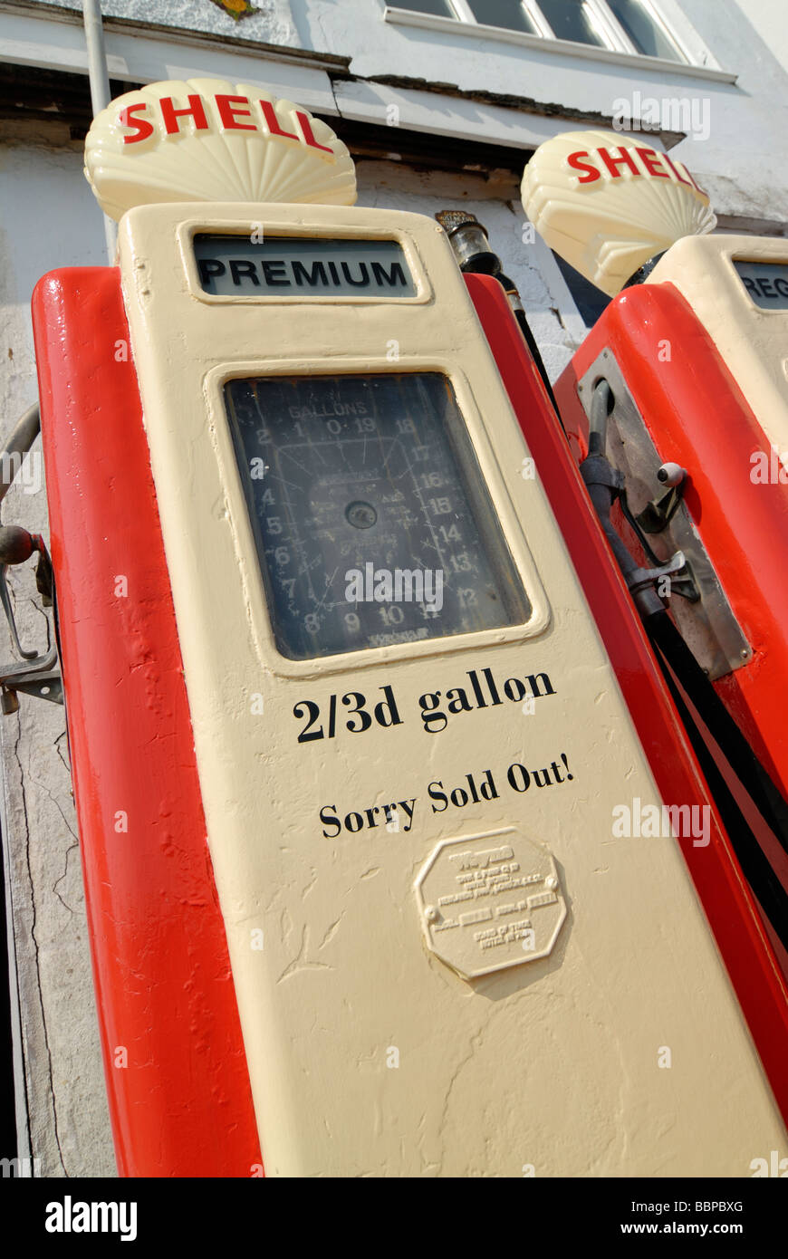 Old Shell petrol (gas) pump carrying the words premium 2/3d gallon 'sorry sold out!' Stock Photo
