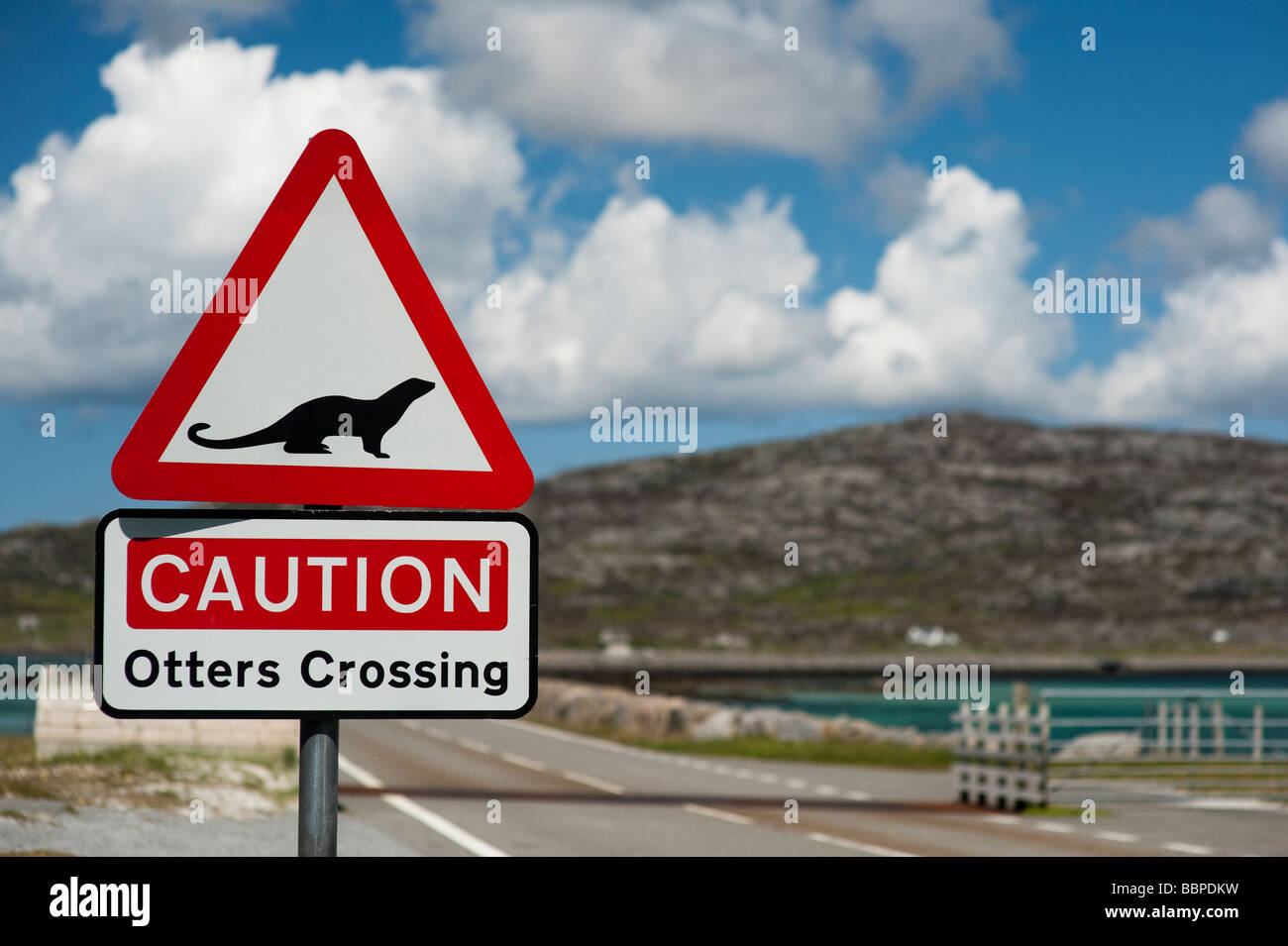 Otter crossing road sign, Eriskay causeway, South Uist, Outer Hebrides, Scotland Stock Photo