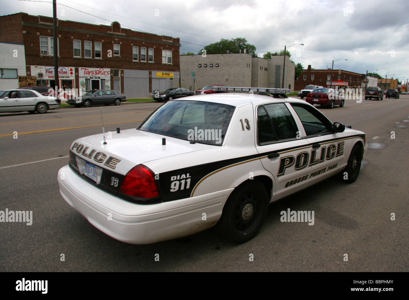 Grosse Pointe Park police car on patrol on Mack Avenue Detroit Michigan