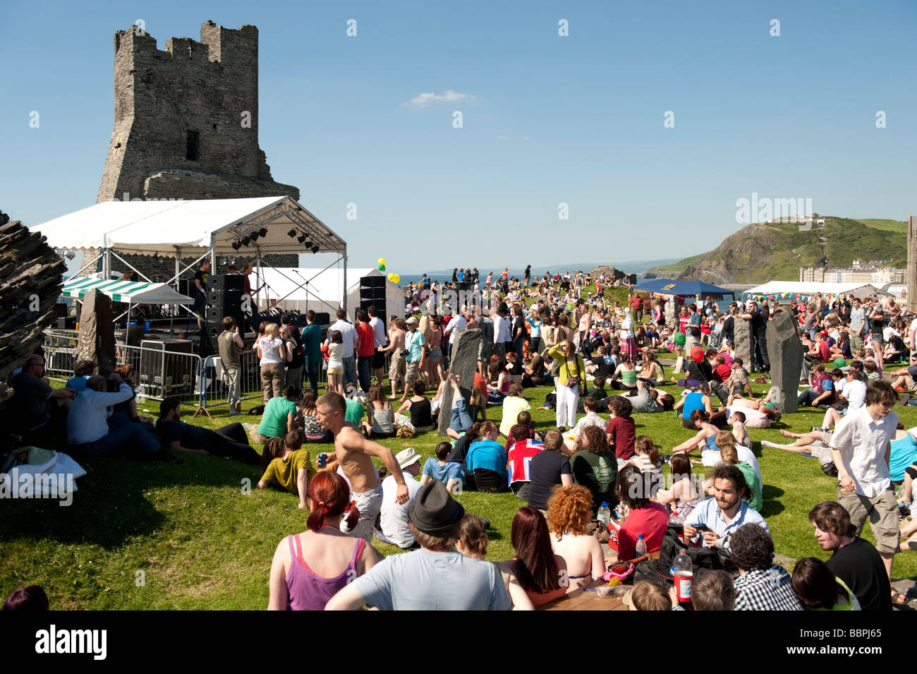crowds of people at Roc y Castell Castle Rock free music festival Aberystwyth Wales UK 30 May 2009 Stock Photo