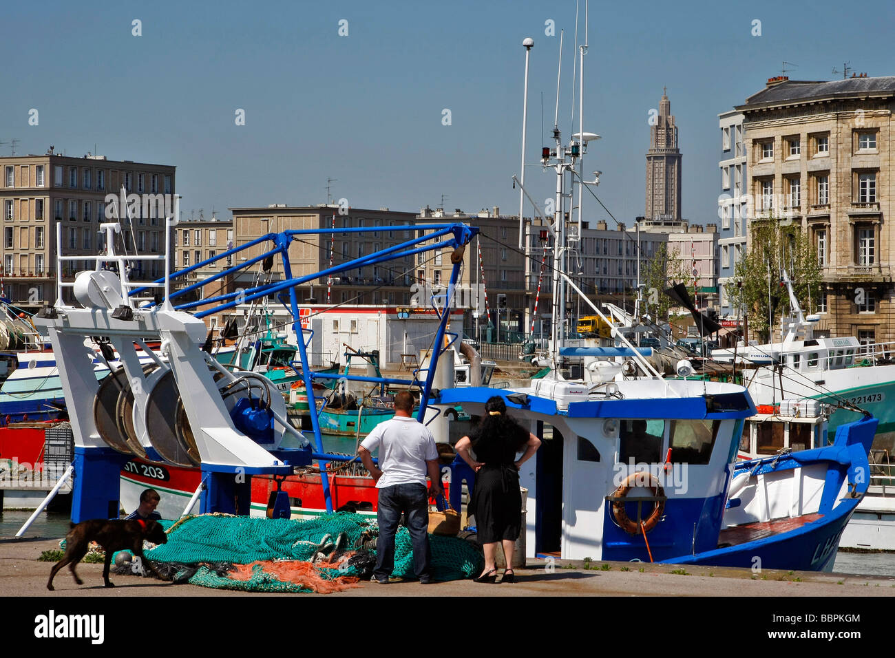 FISHING PORT IN FRONT OF THE SHIPOWNER'S HOUSE AND SAINT JOSEPH CHURCH, LE HAVRE, SEINE-MARITIME (76), NORMANDY, FRANCE Stock Photo