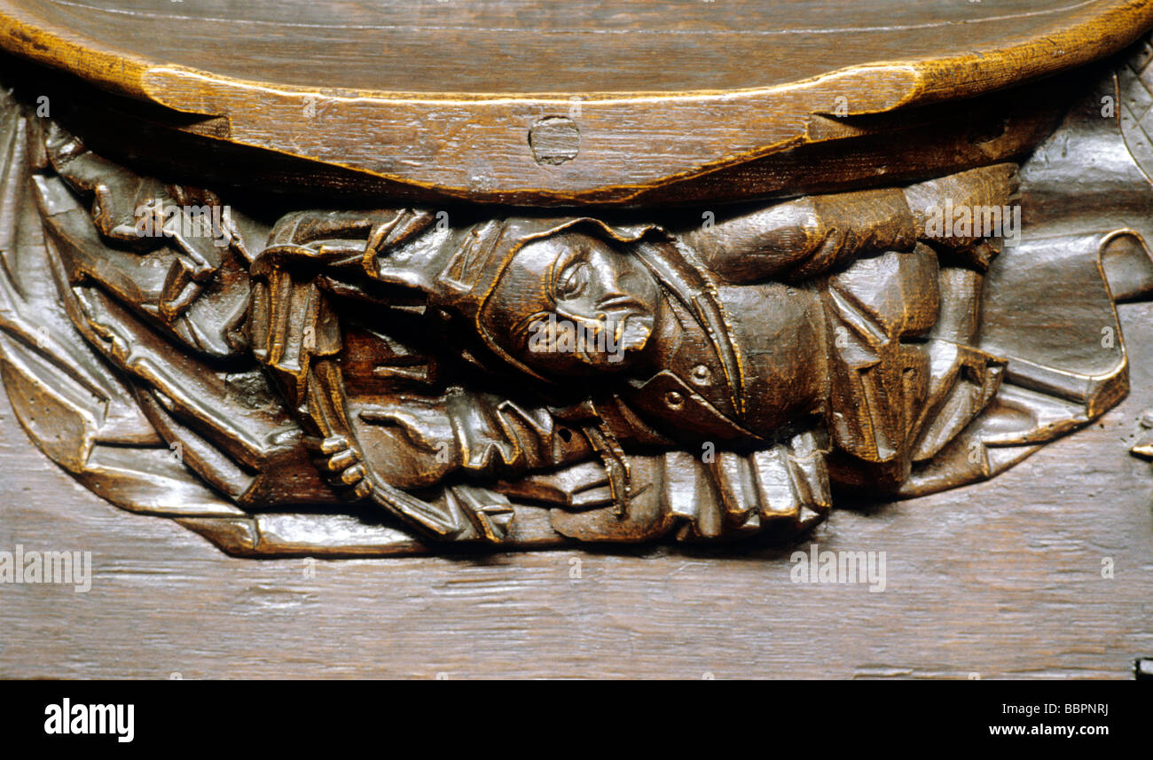 Misericord Christchurch Priory interior Hampshire England UK Medieval woodcarving figure art woodwork Stock Photo