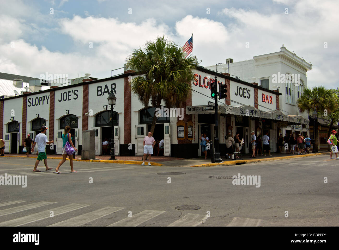 Tourists milling about Sloppy Joes Bar in Key West favorite watering