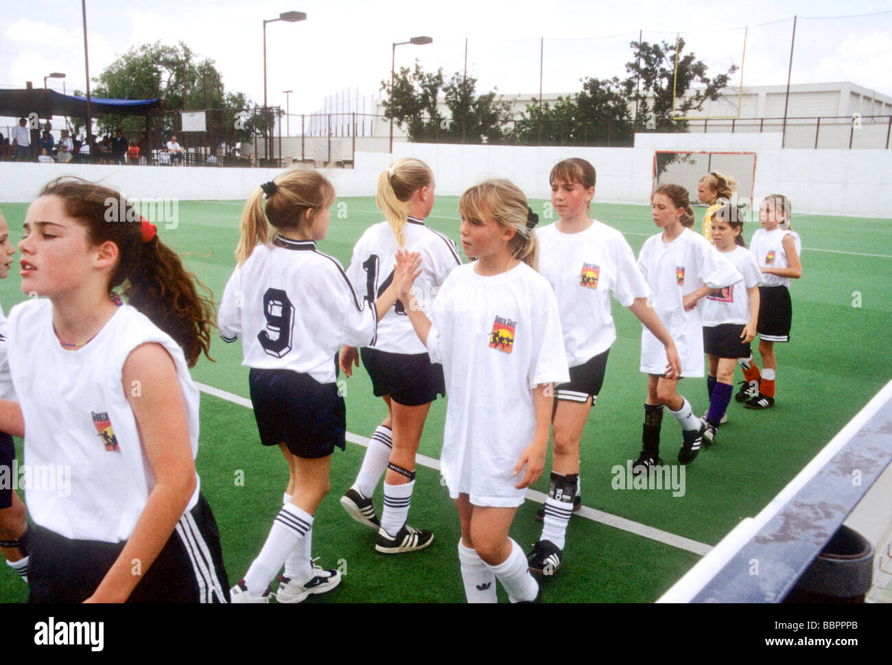 girl sport team shake hand congratulate good fair play sportsmanship