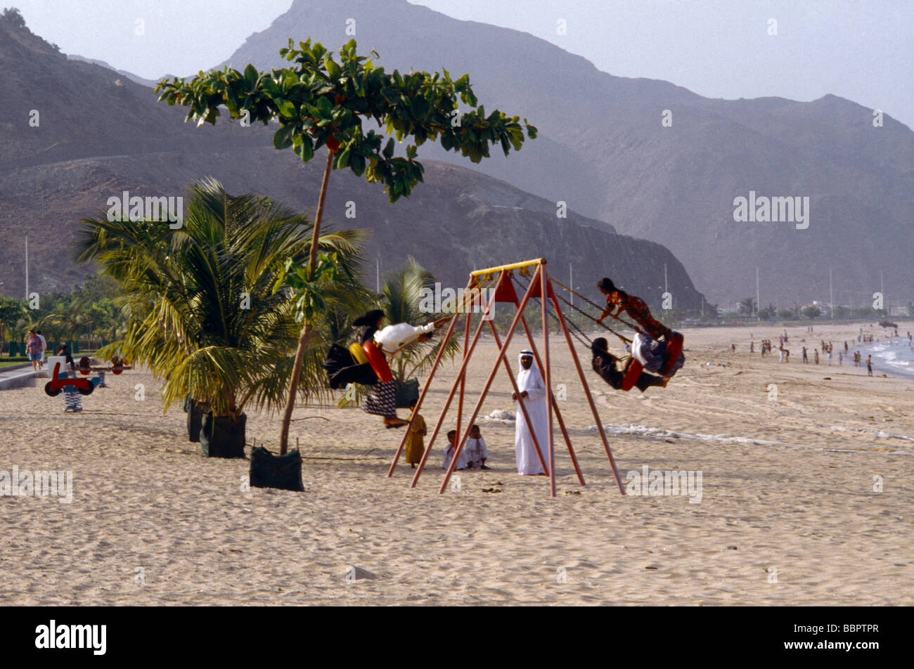 Sharjah UAE Oceanic Hotel Beach Khor Fakkan Swings Stock Photo - Alamy