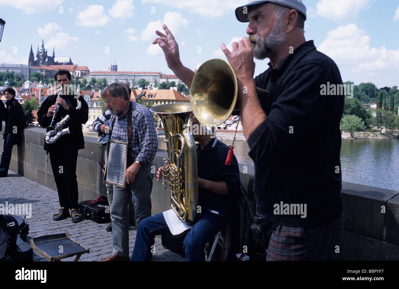 Buskers playing on Charles Bridge Prague Stock Photo