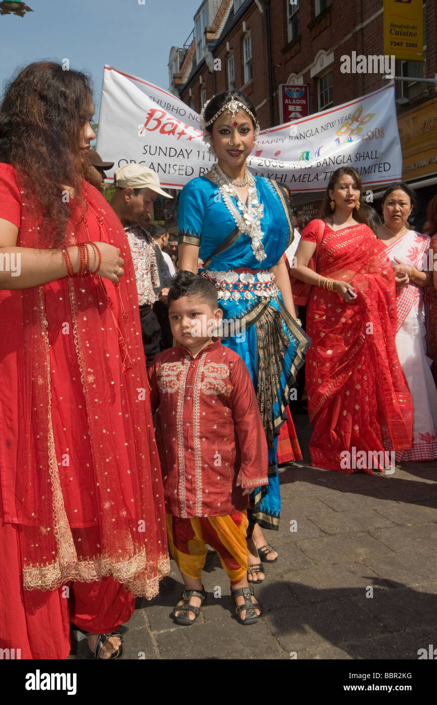 Women and a boy model fashion dress in Baishakhi Mela Procession  celebrating the Bangladesh New Year in London's Brick Lane Stock Photo -  Alamy