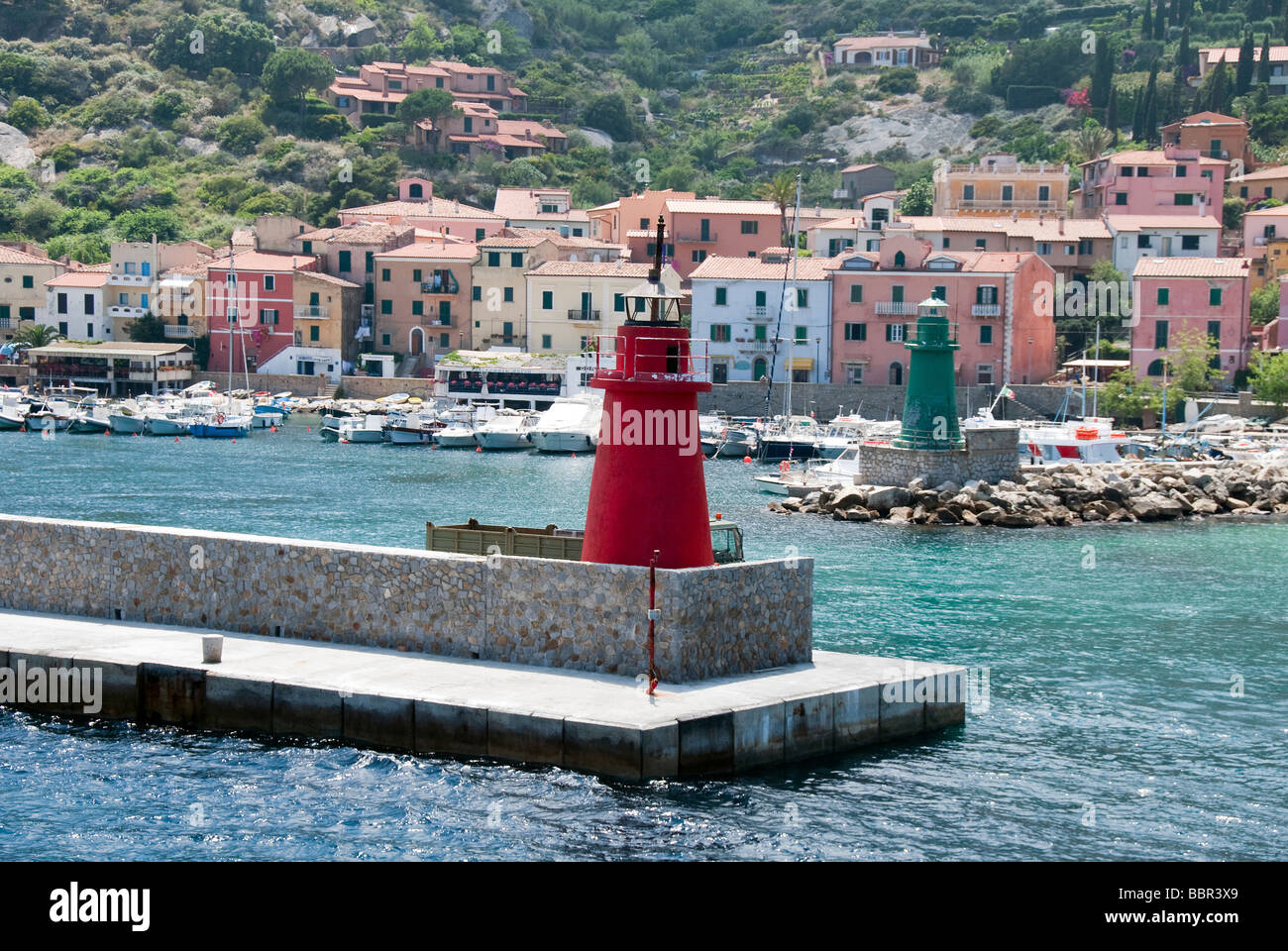 Red and green lighthouses at the entrance to Porto Giglio on the Island of Giglio or Isola del Giglio off the Tuscan coast Stock Photo