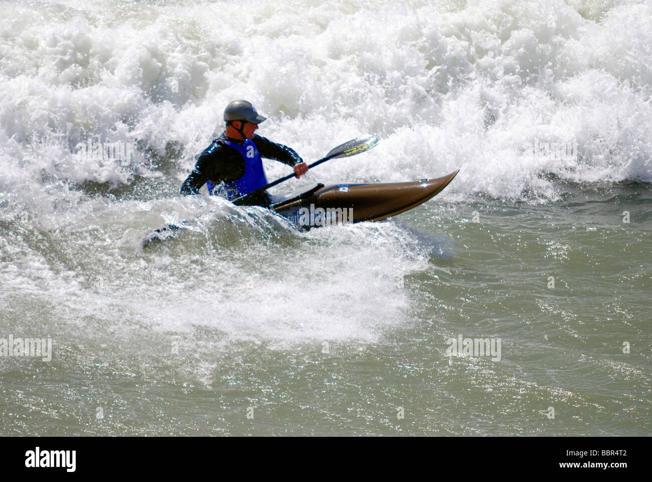 Man kayaking in rough seas Stock Photo Alamy