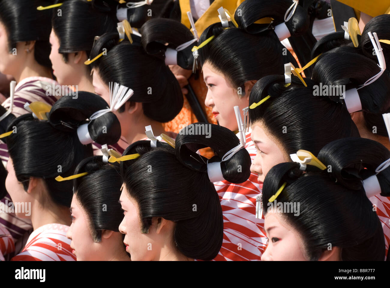 A group of women dressed in festival costume and wearing a traditional wigs during the Himesama Dochu event in Kiga, Hosoe Stock Photo