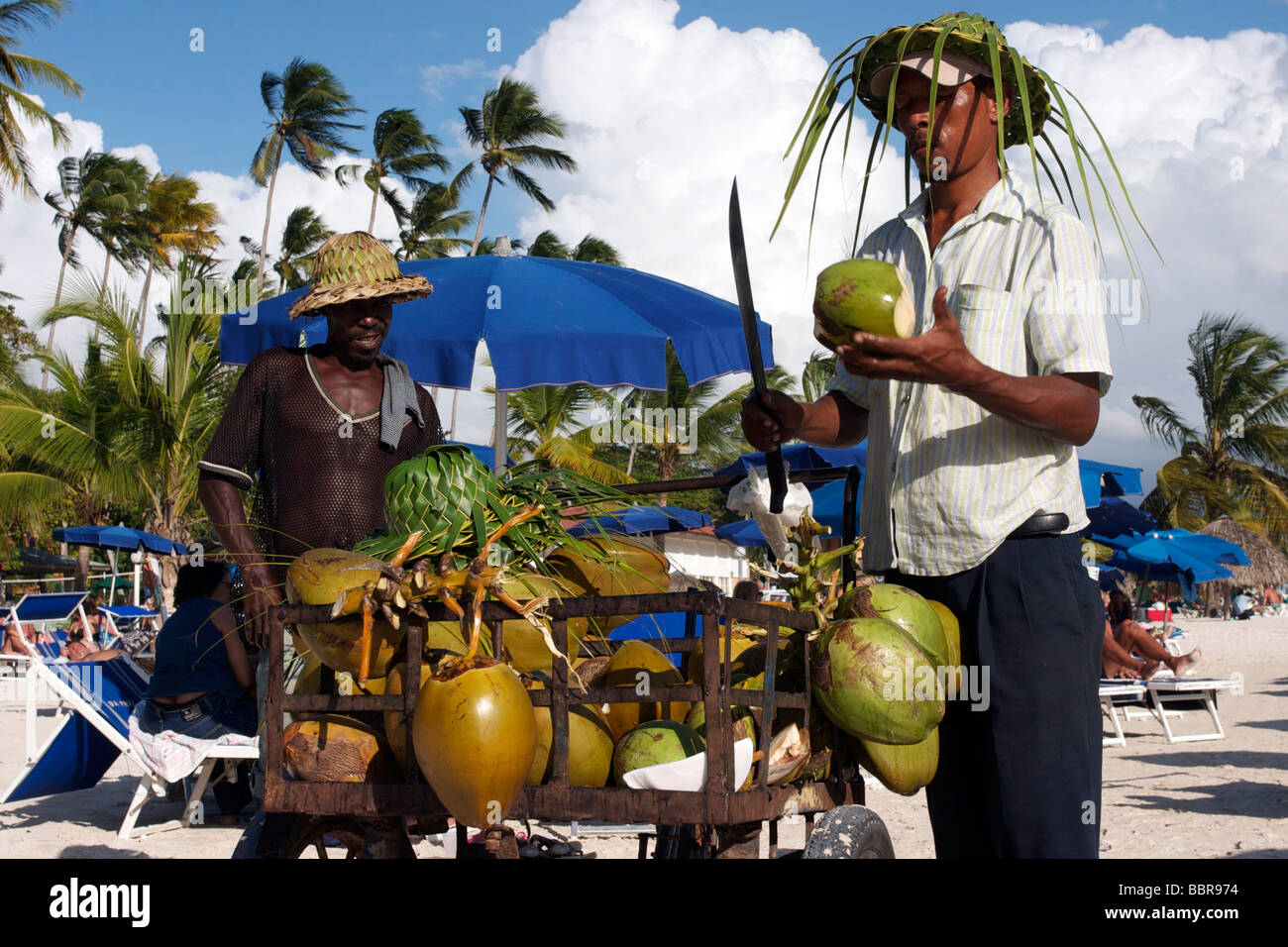 COCONUT SELLER ON A BEACH IN PUNTA CANA, DOMINICAN REPUBLIC Stock Photo Alamy