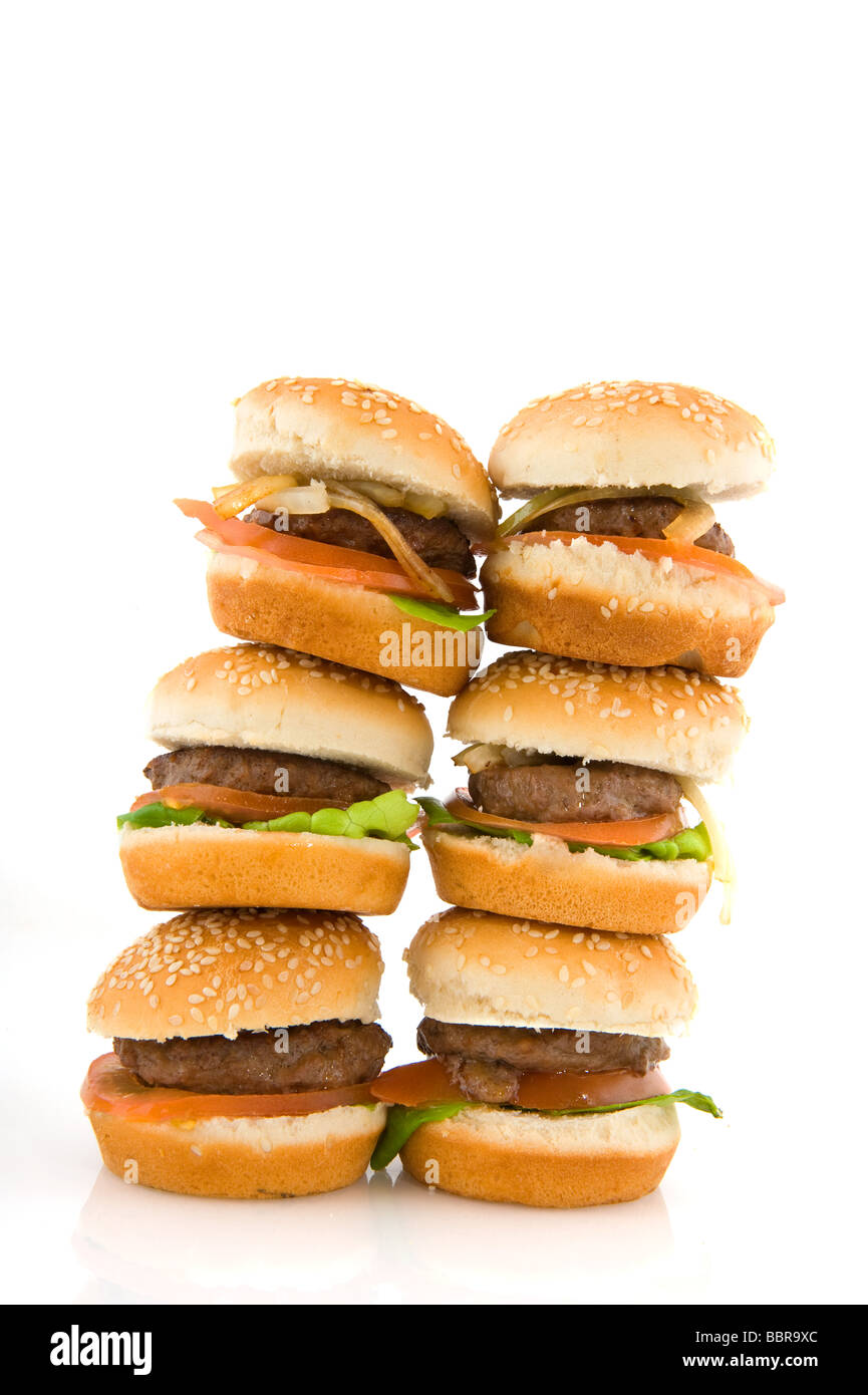 stacked hamburgers with bread isolated over white Stock Photo