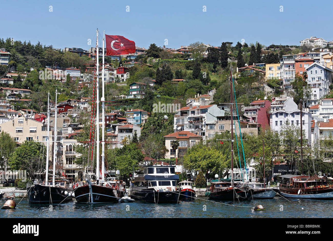 Old harbor with sailboats, Bosphorus shore in Arnavutkoey, Istanbul, Turkey Stock Photo