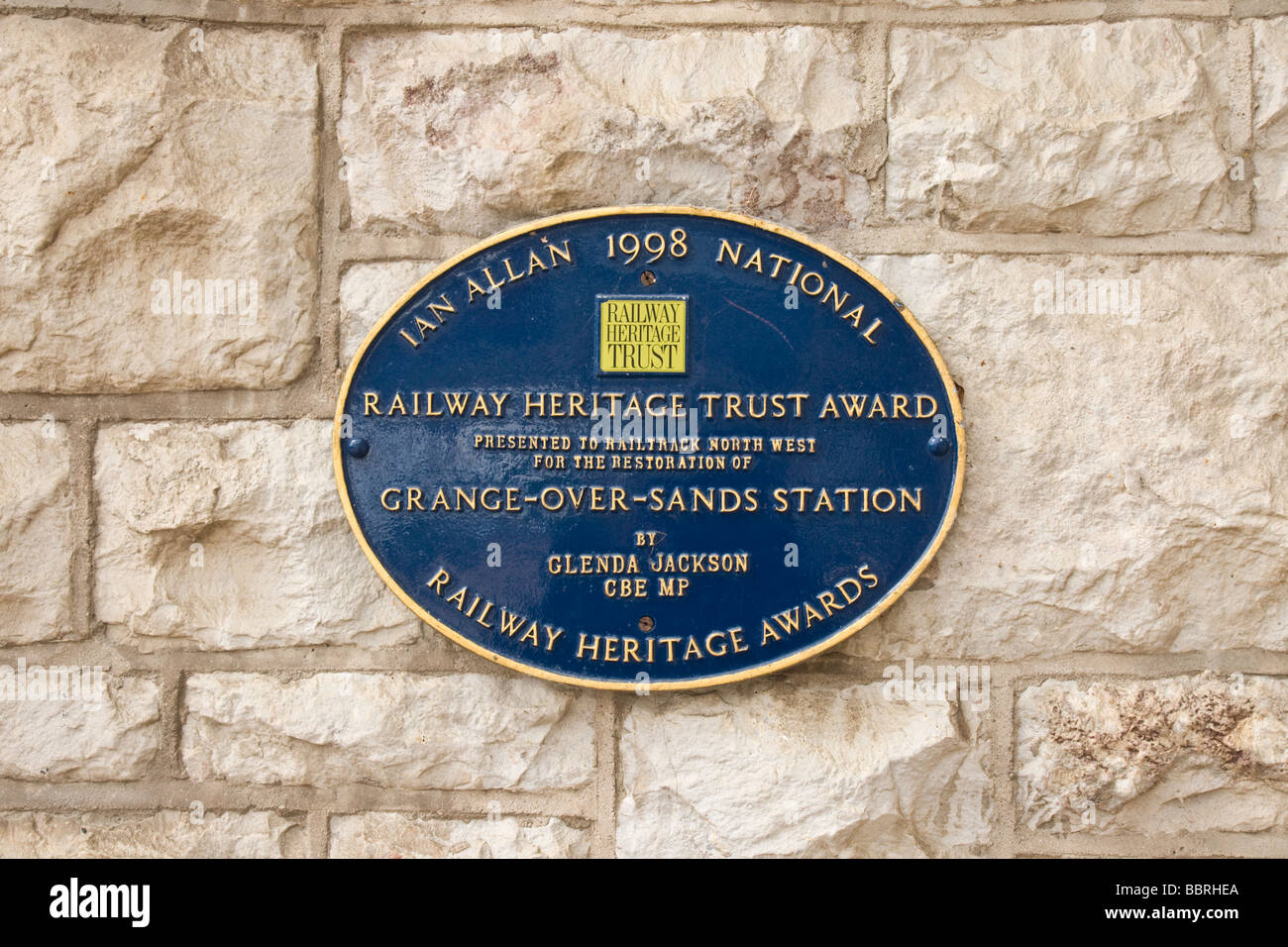 Award plaque at Grange over Sands railway station. Stock Photo