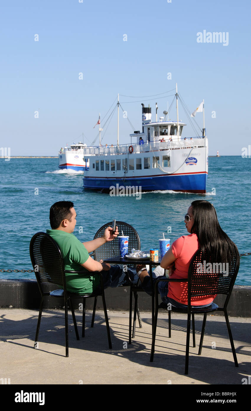 Navy Pier on Lake Michigan Chicago Illinois USA Tourists on lakeside Stock Photo