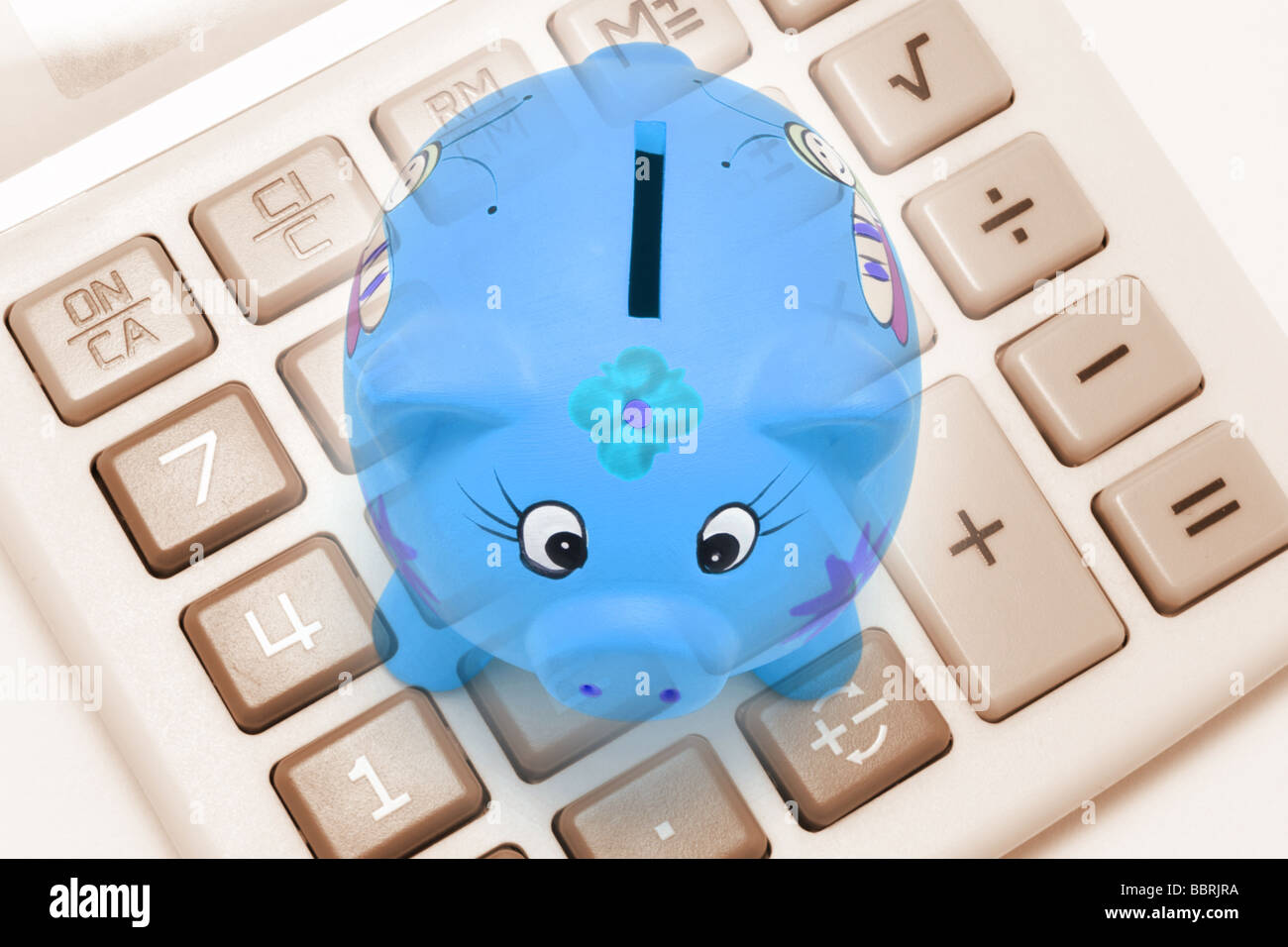 Calculator and Piggy Bank Stock Photo - Alamy
