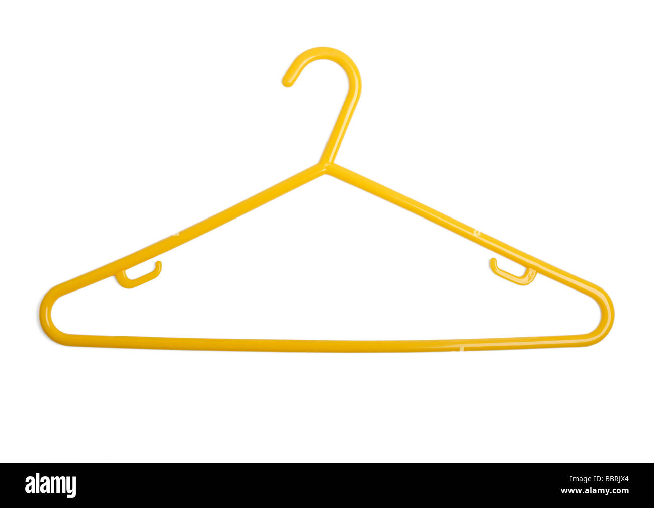 Yellow plastic coat hanger on white background Stock Photo