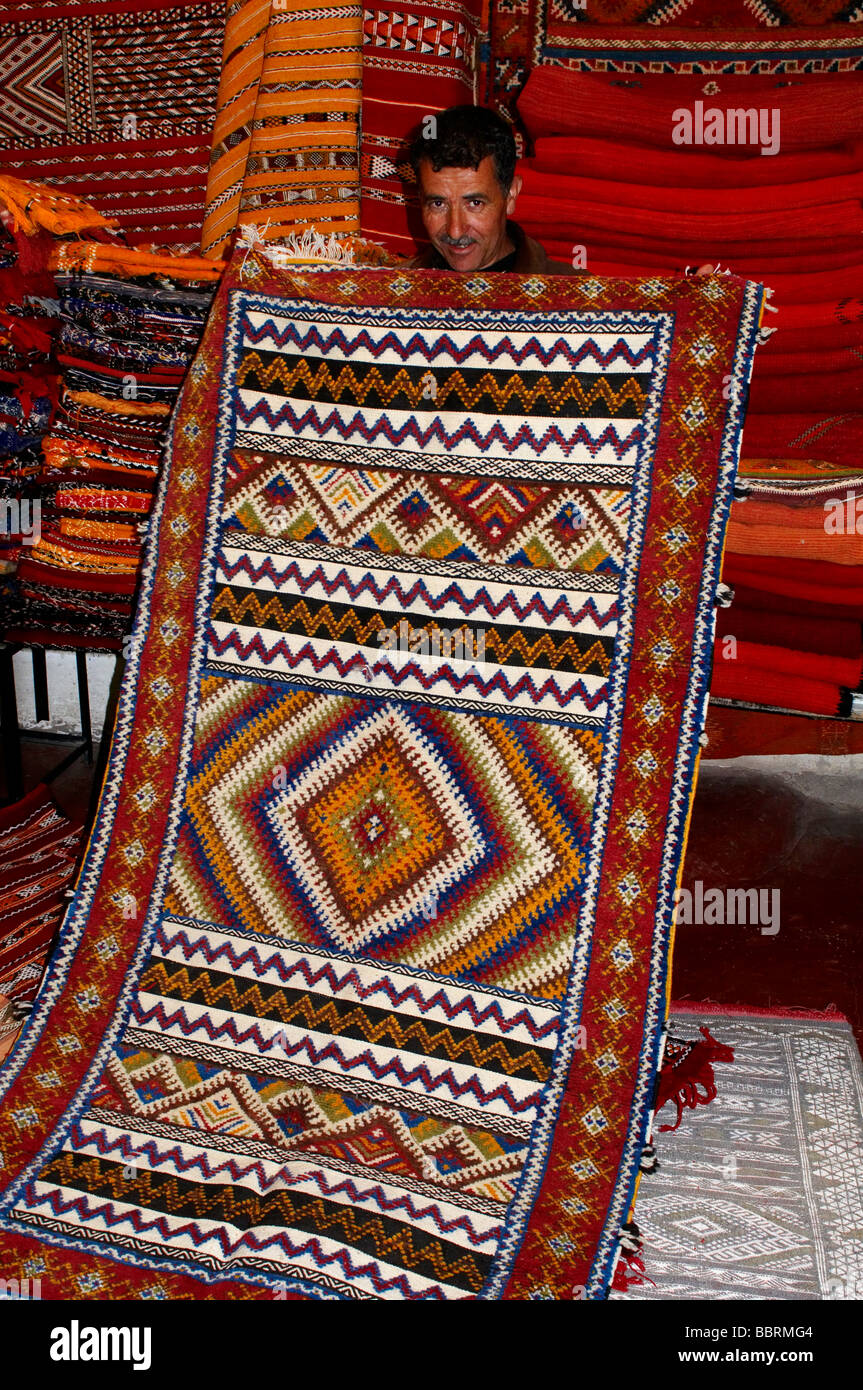 The Co-operative of Berber carpet makers at La Kasbah de Teifirte in the Ourika Valley with colourful display of carpets Stock Photo
