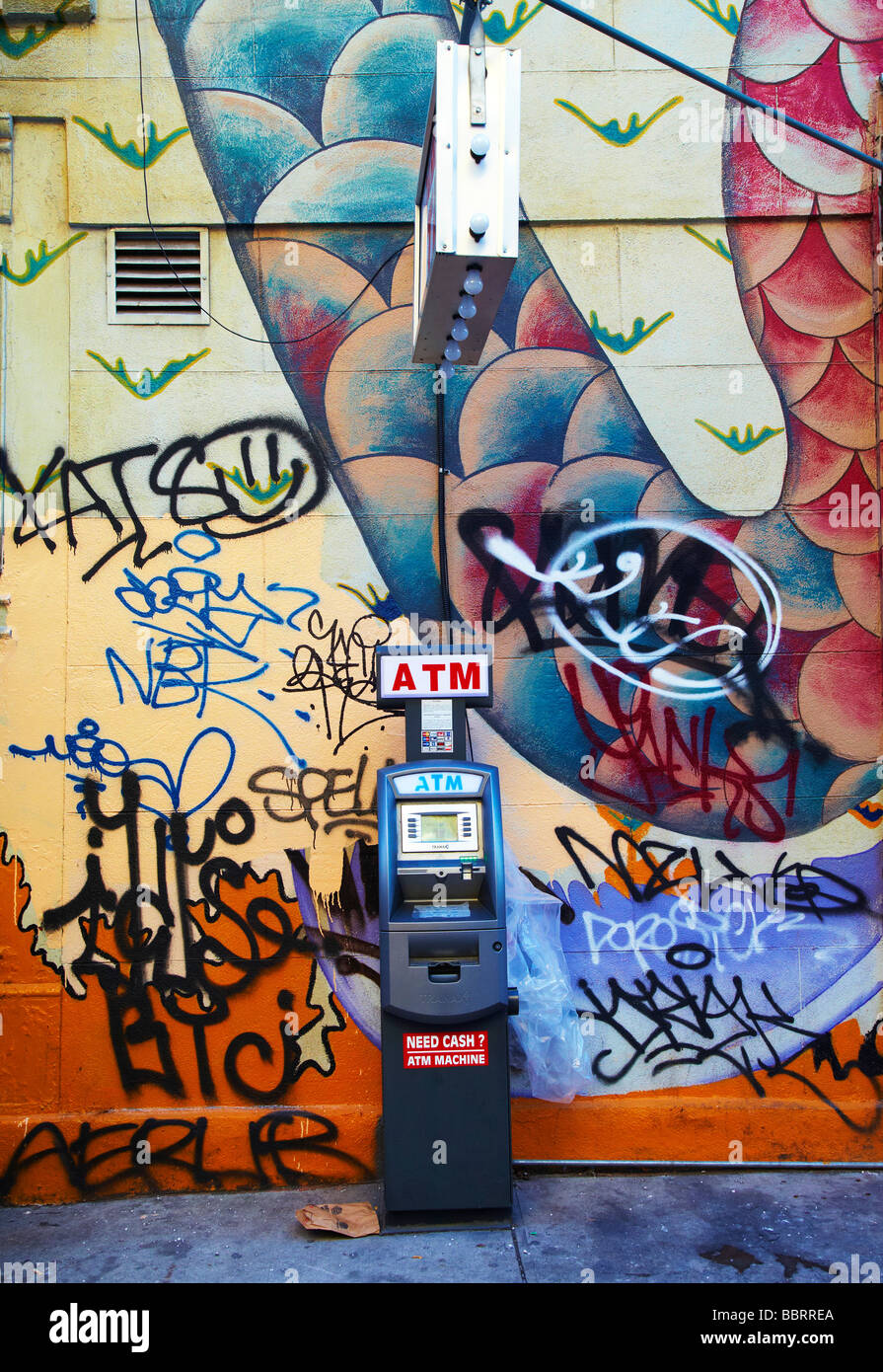 cash machine with graffiti wall, New York Stock Photo Alamy
