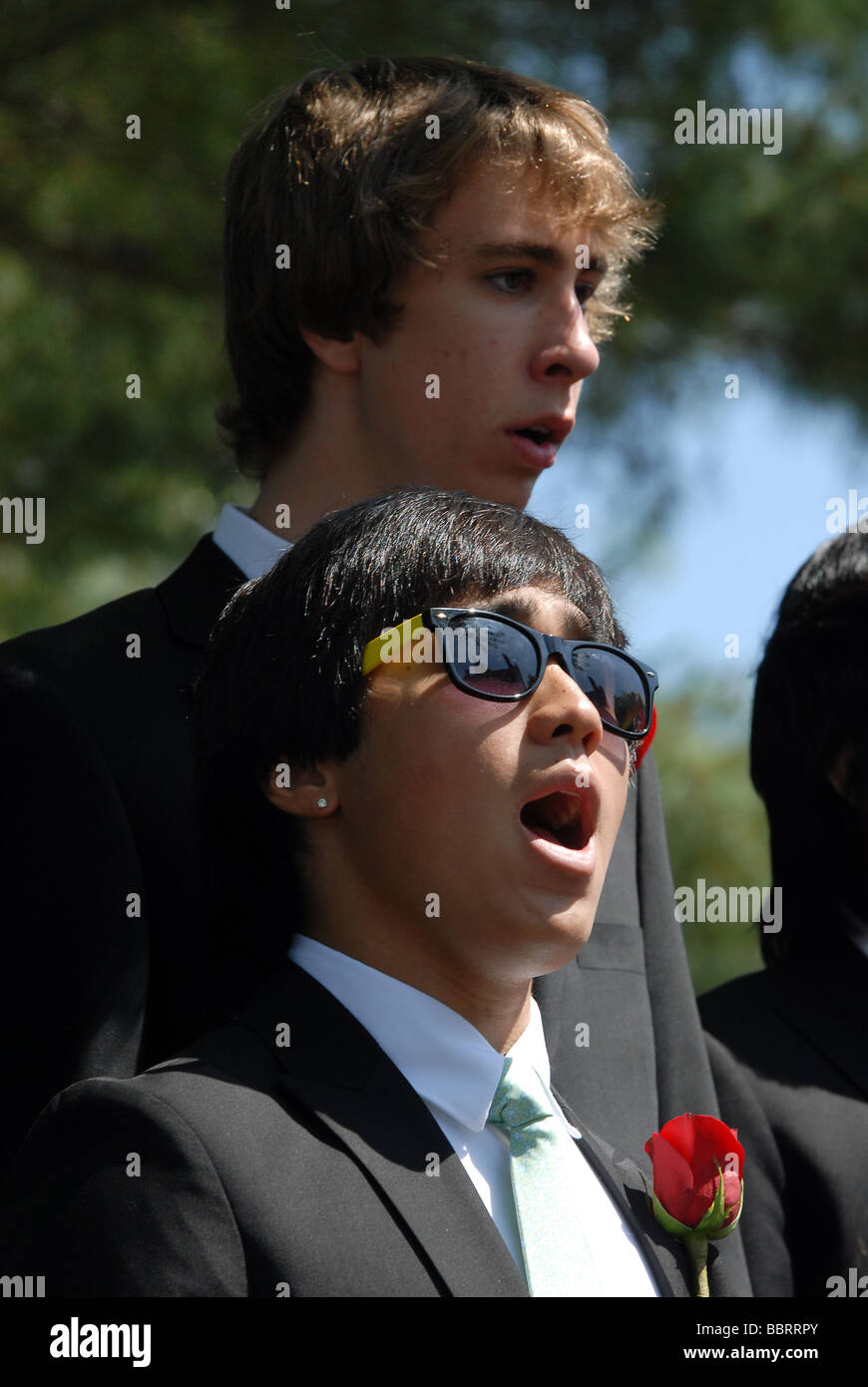 Choir members sing during commencement ceremonies at Choate Rosemary Hall prep school in Wallingford CT USA Stock Photo