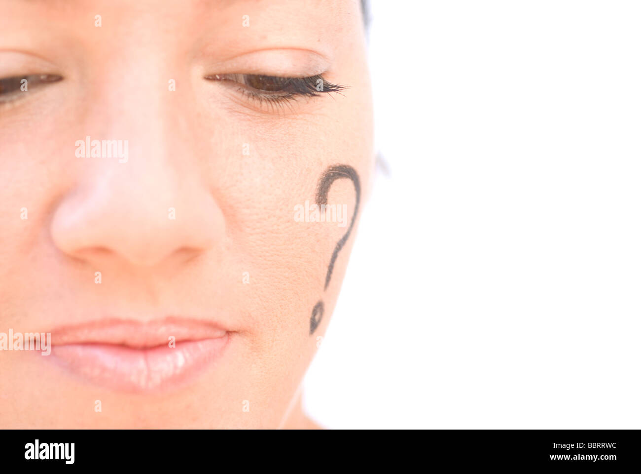 Question mark simbol painted in woman´s face and thinking on answer Stock Photo