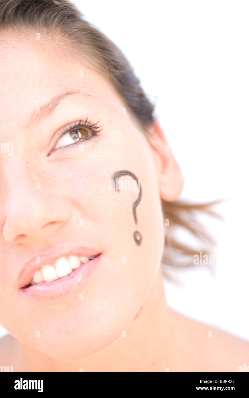 Question mark simbol painted in woman´s face and thinking on answer ...