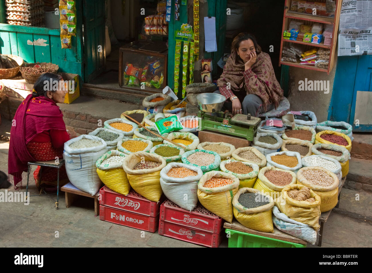 Kathmandu, Nepal. Market Vendor of Rice, Beans, and Grains, Durbar Square. Stock Photo