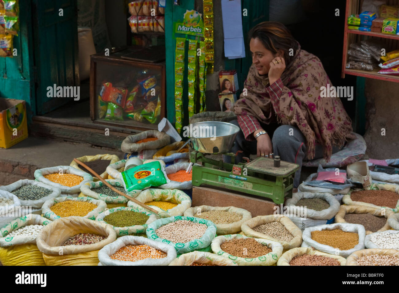 Kathmandu, Nepal. Market Vendor of Rice, Beans, and Grains, Durbar Square. Stock Photo