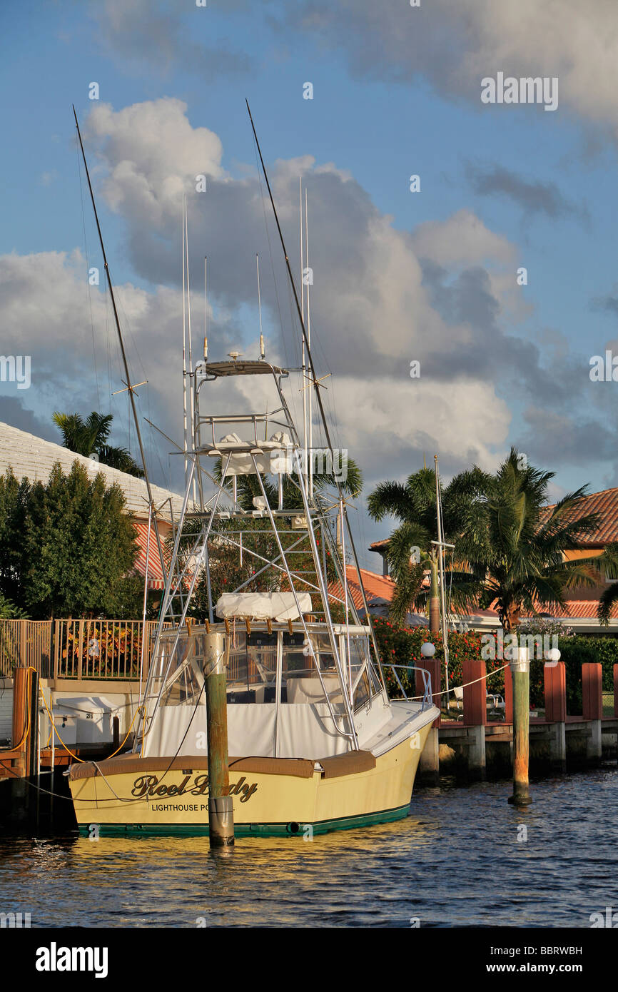 PLEASURE BOAT ON THE CANALS, LIGHTHOUSE POINT NEAR MIAMI, FLORIDA, USA ...