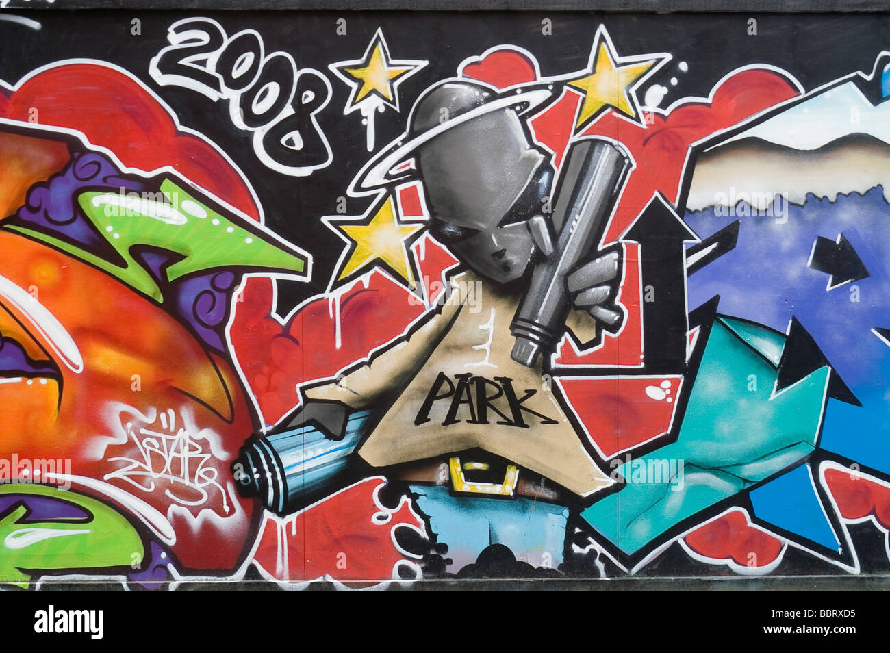 Bright and colourful graffiti detail on a wall Stock Photo