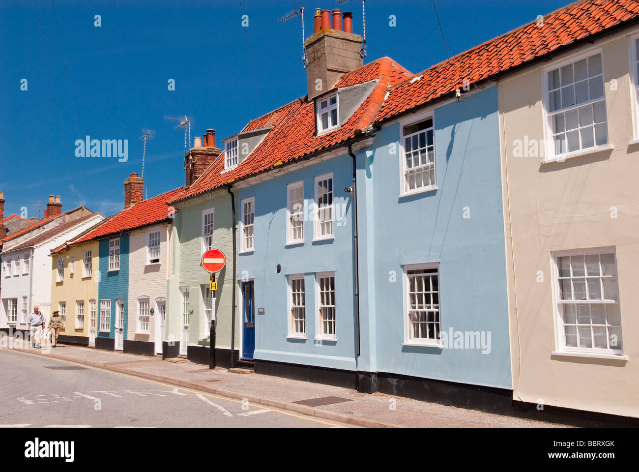 A view of a row of pretty terraced colourful houses in the seaside town of Southwold Suffolk Uk Stock Photo